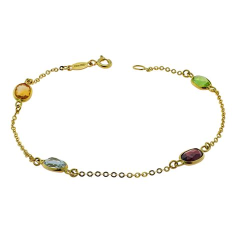 Bracciali da donna in oro con pietre preziose .